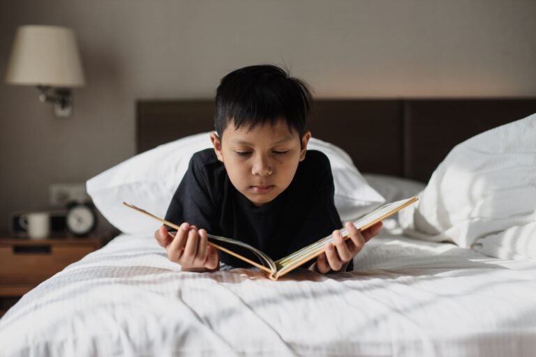 A boy reading a book.