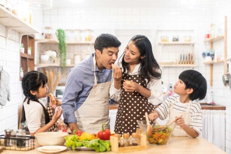 A family preparing healthy food with the children.